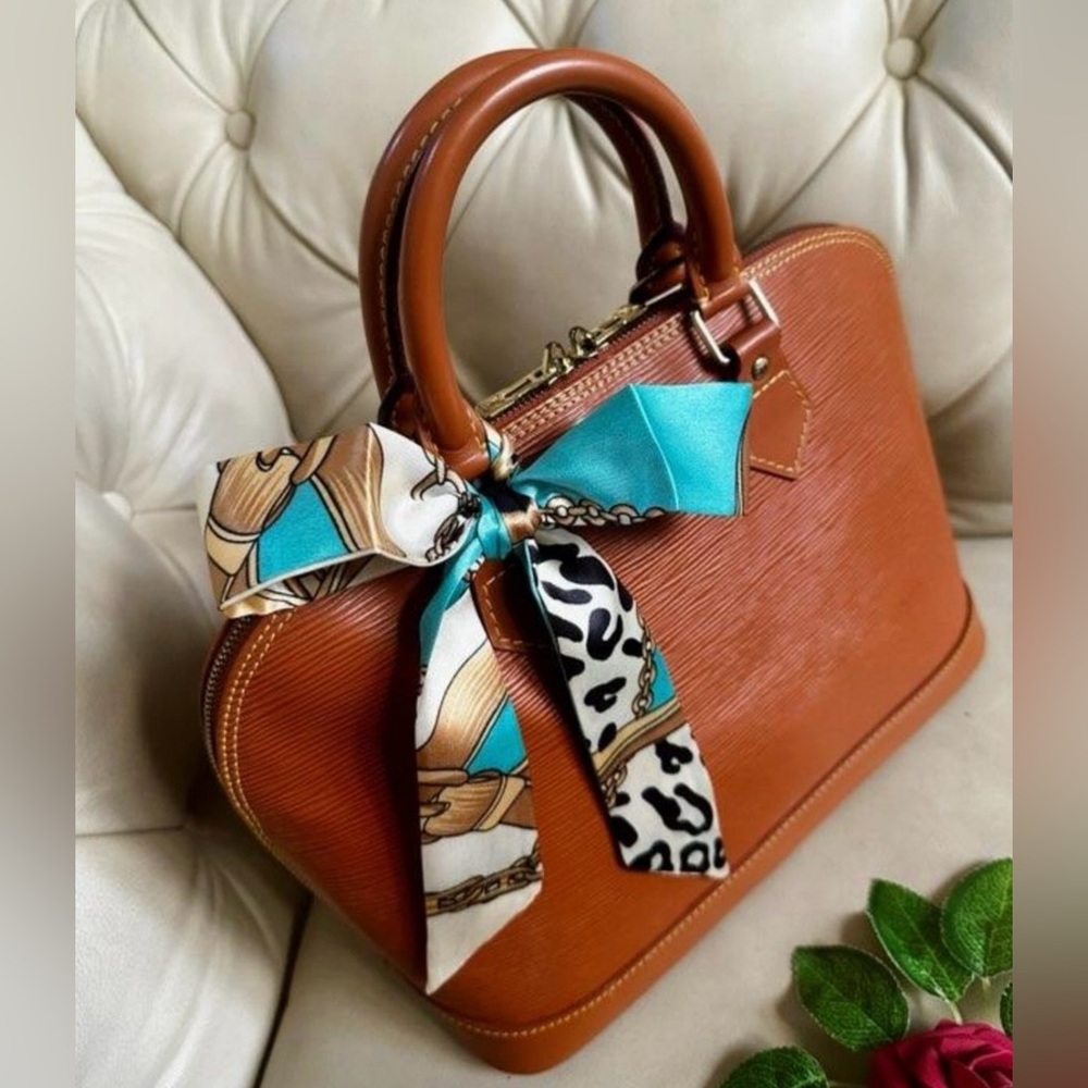 Louis Vuitton EUC Epi Alma PM